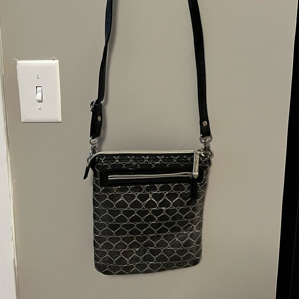 Betsey Johnson Crossbody purse in silver. Used but in great condition!